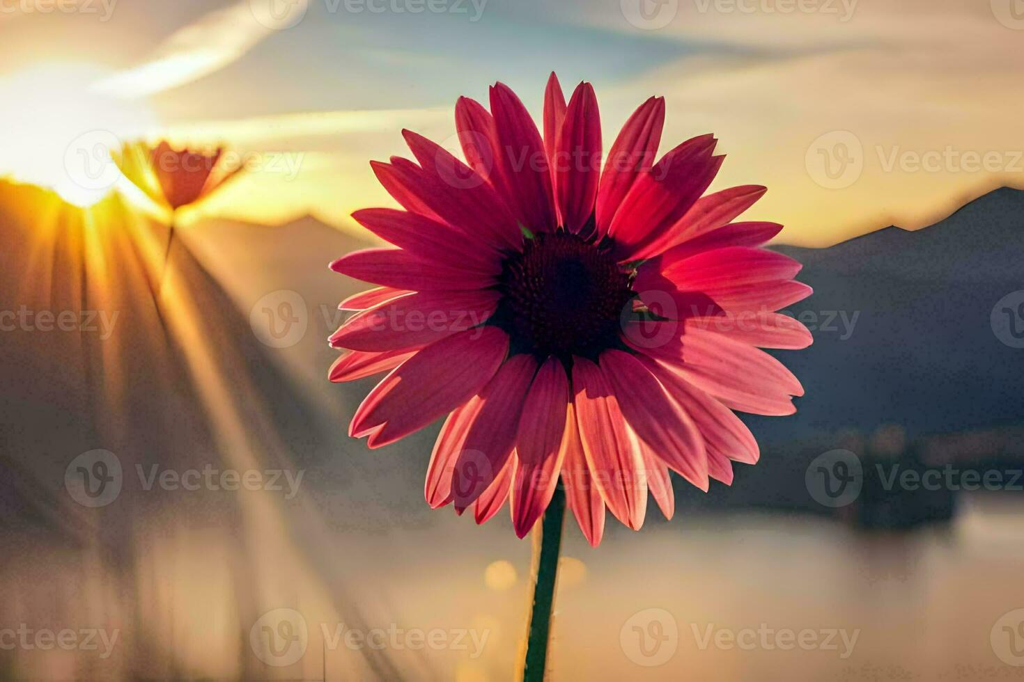 un rosado flor es en frente de un lago y montañas. generado por ai foto