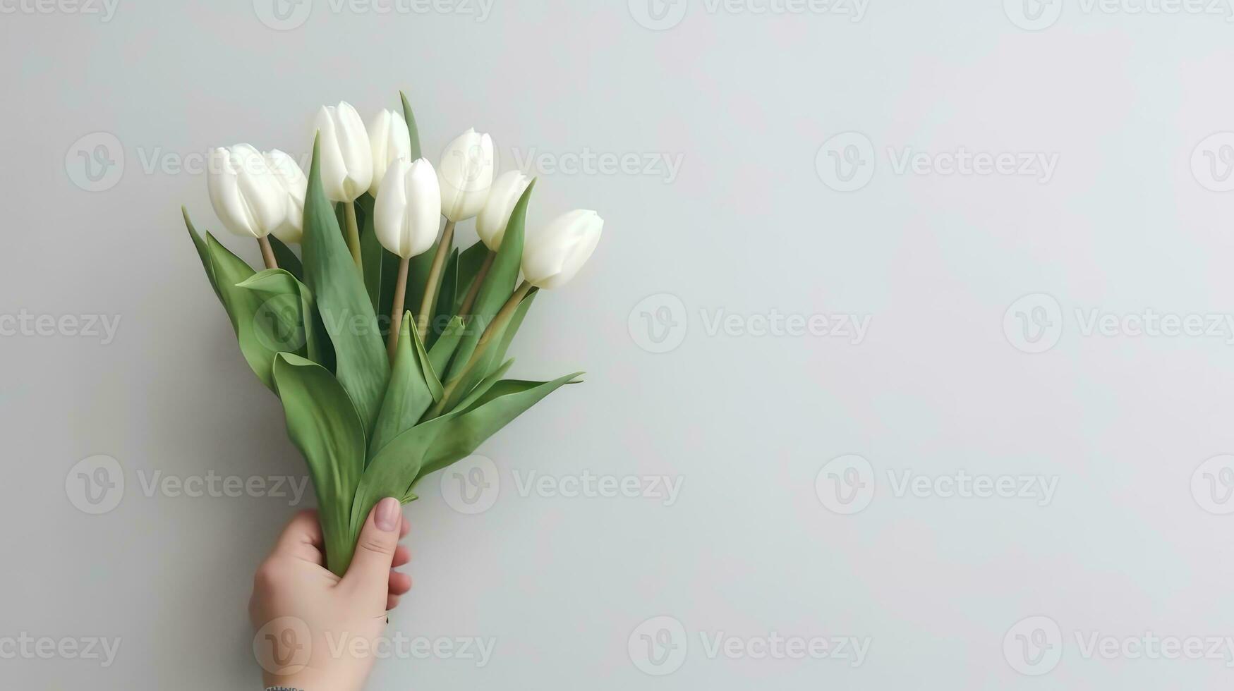 Hand holding a beautiful bouquet of tulip flowers. Isolated on a light wall background. AI Generated photo