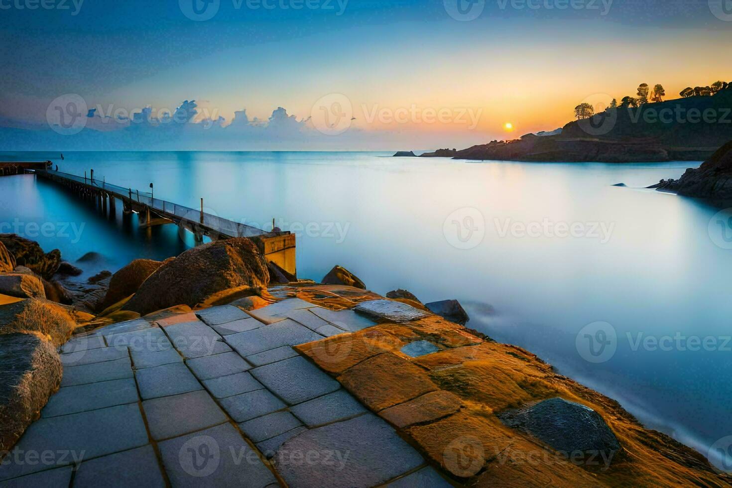 the sun sets over the ocean and rocks. AI-Generated photo