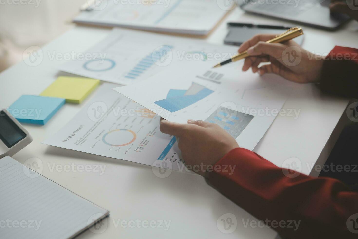 Close up Business woman using calculator and laptop for do math finance on wooden desk, tax, accounting, statistics and analytical research concept photo