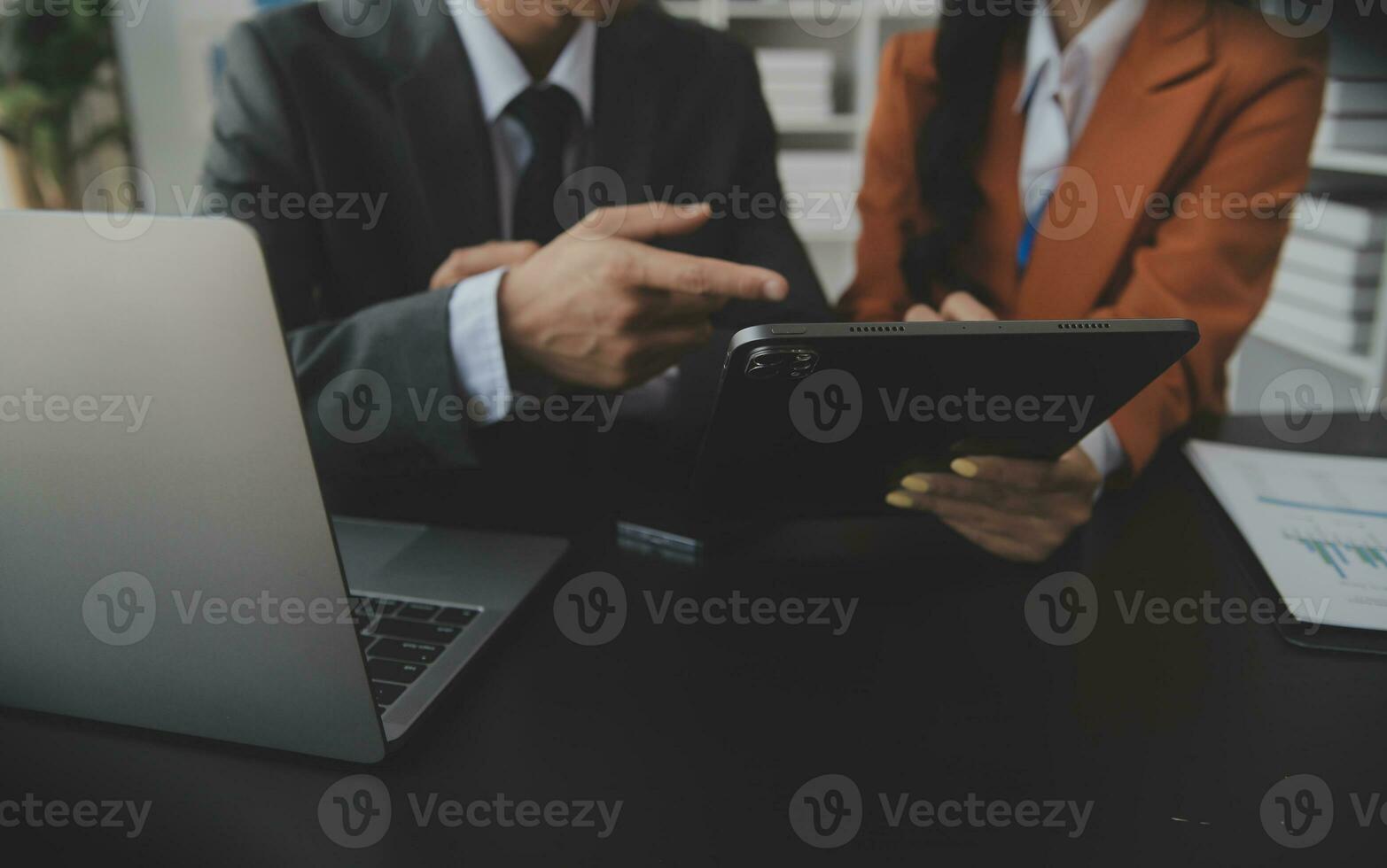 Entrepreneurs and business people conference in modern meeting room, happy multiracial coworkers have fun cooperating working together at office meeting, asian teamwork concept photo