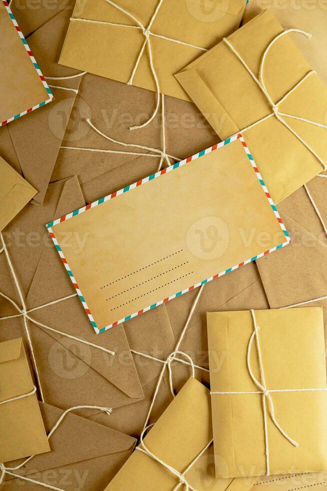 Christmas envelope mockup. Empty letter mock up on lots of craft envelopes and letters. photo