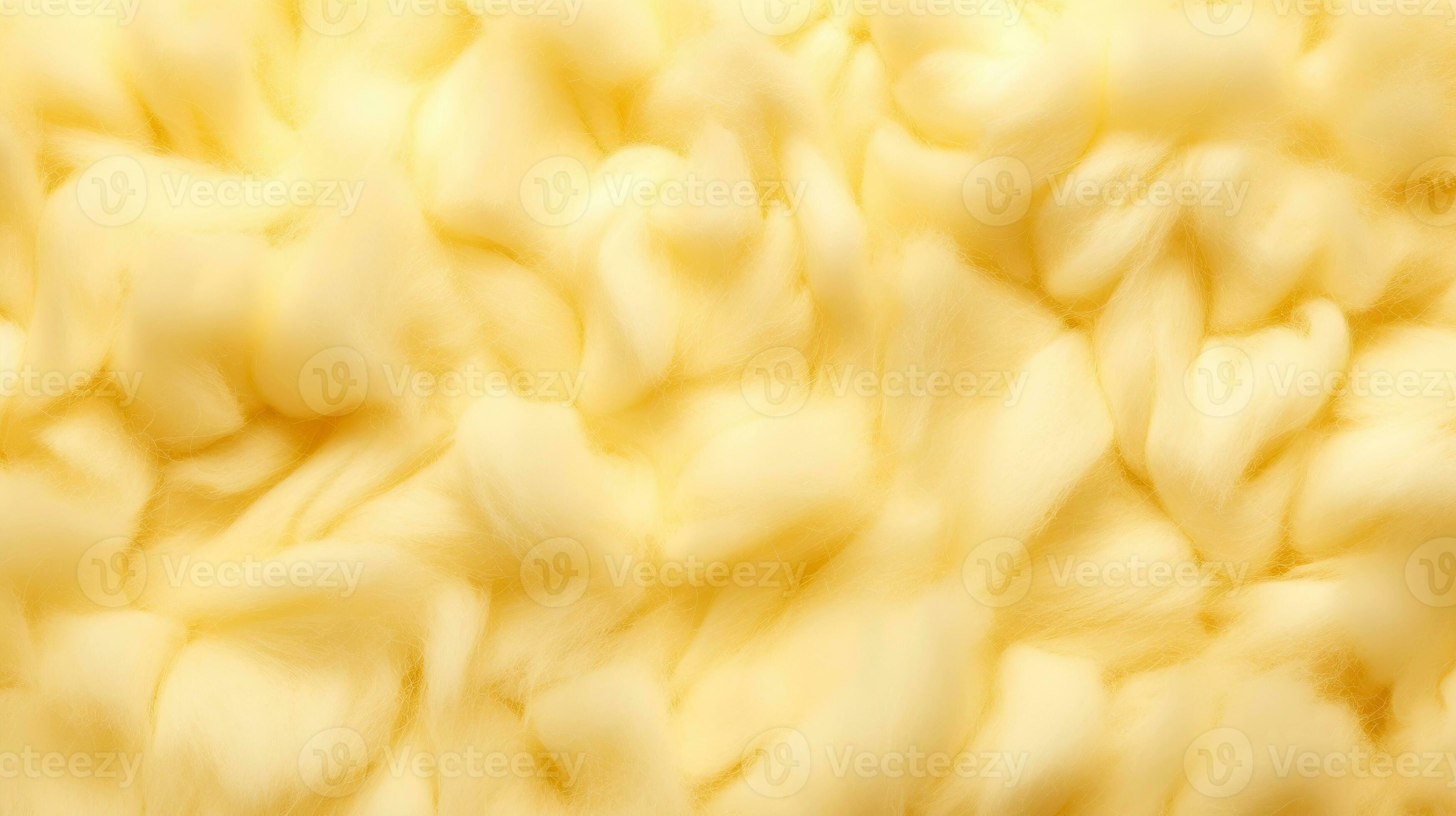 Soft yellow wool texture as background, close-up. Cotton texture light