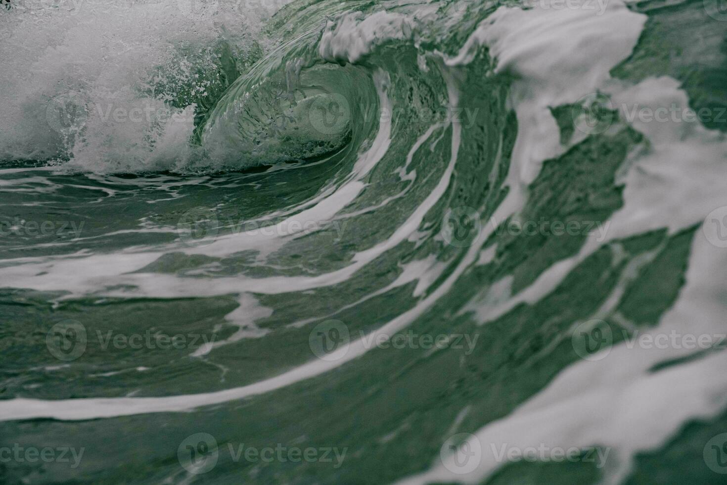 a wave in the ocean photo