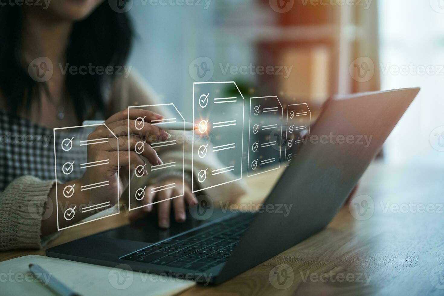 Electronic signature or checking list, Business woman using pen checking digital virtual screen document, document management, paperless office, signing business contract, electronic document system. photo
