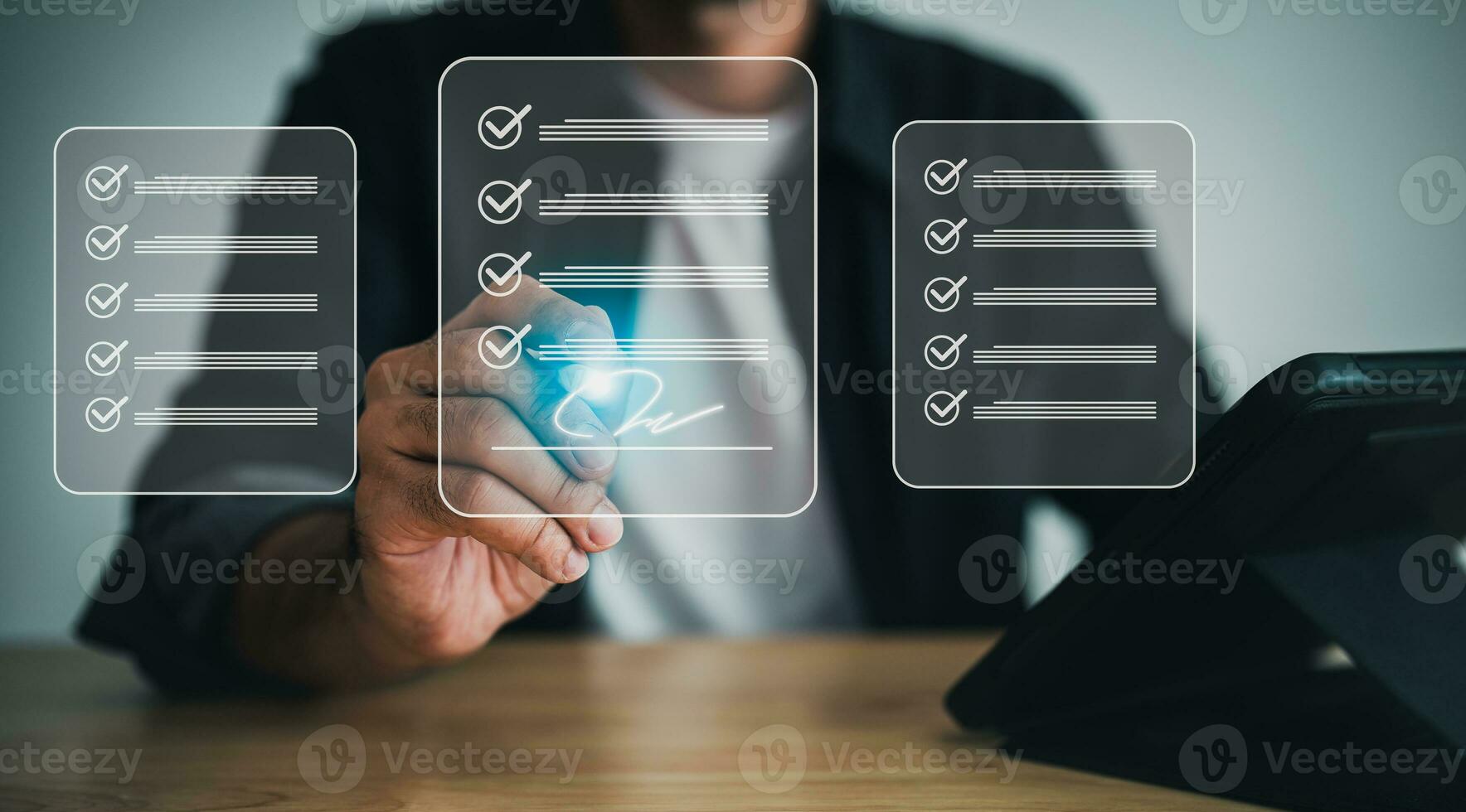 Electronic signature or checking list, Business man using pen checking digital virtual screen document, document management, paperless office, signing business contract, electronic document system. photo