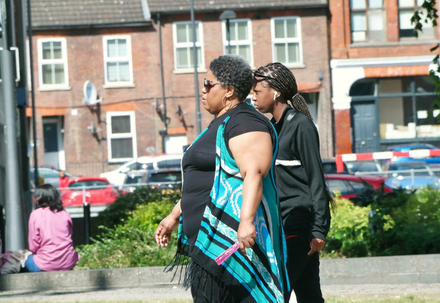 People are Walking at Main Shopping Center of Downtown City Centre of Luton City, England Great Britain UK. Image Captured on June 2nd, 2023 photo