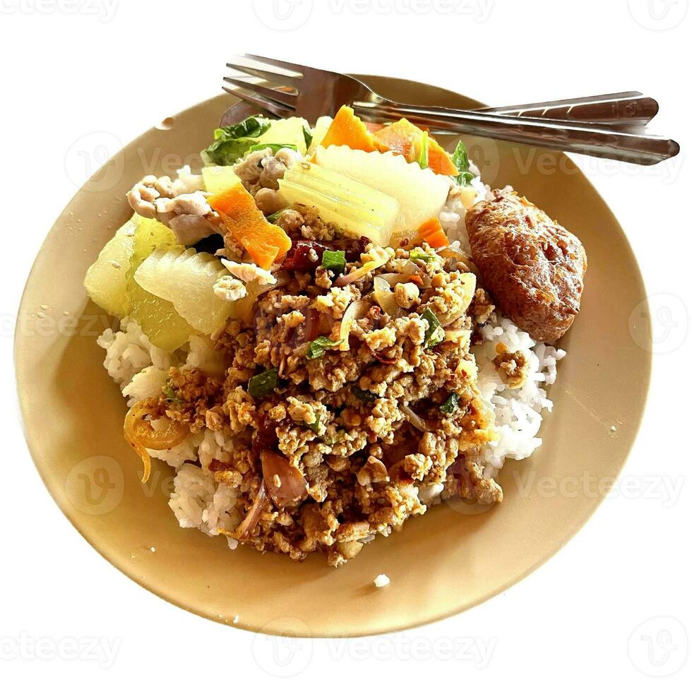 Rice topped with various types of food is called khao topped with curry photo