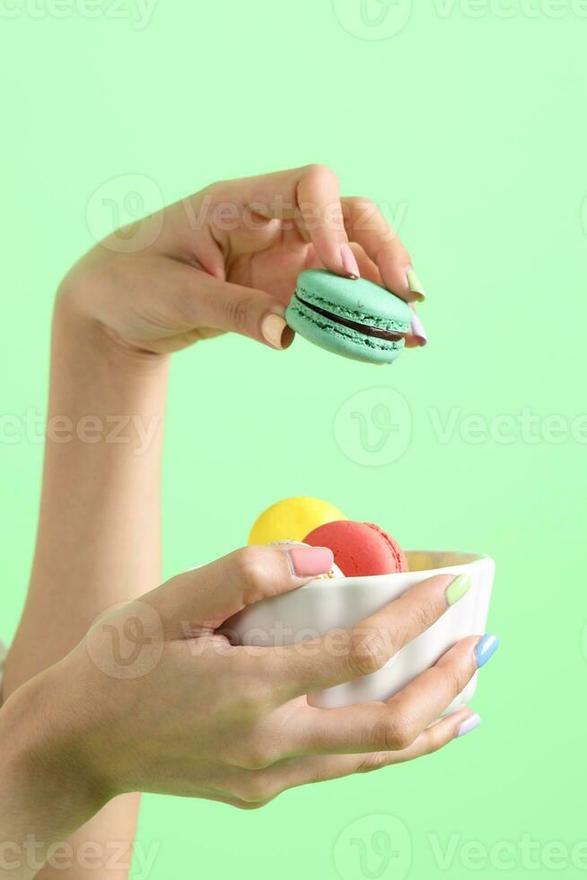 Hand with Macaroons photo