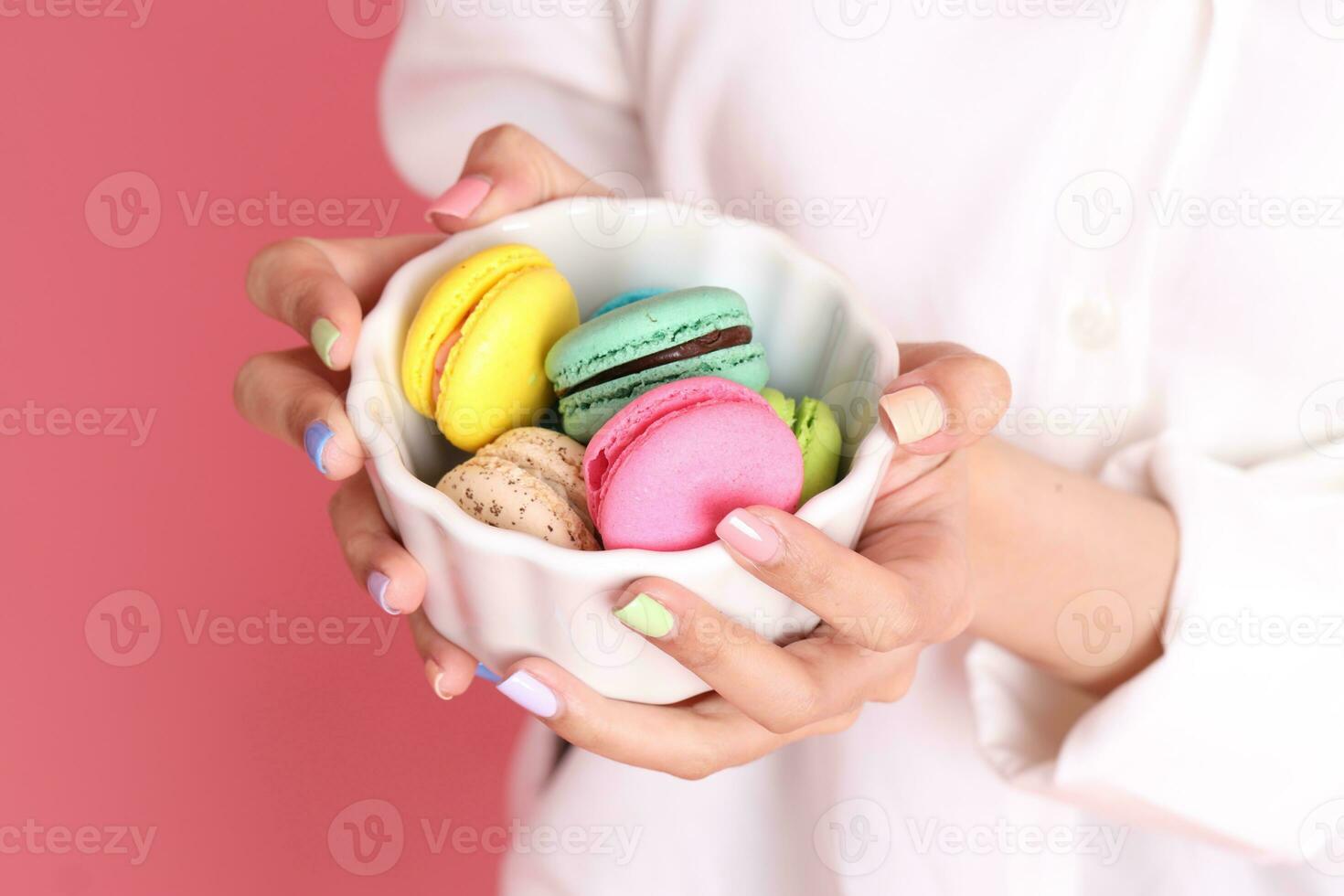 Hand with Macaroons photo