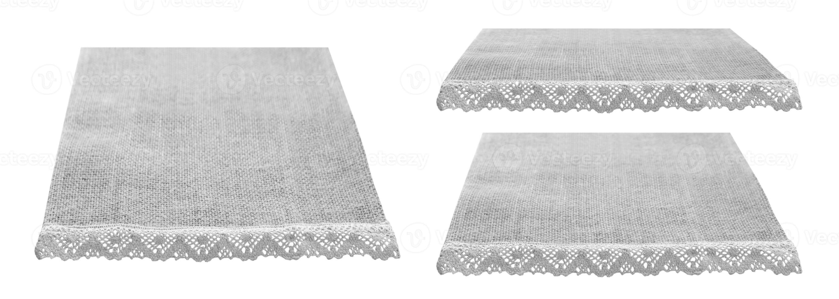 Thre canvas napkins with lace, natural burlap runner perspective isolated on white set. Can used for display or montage product. Selective fokus photo