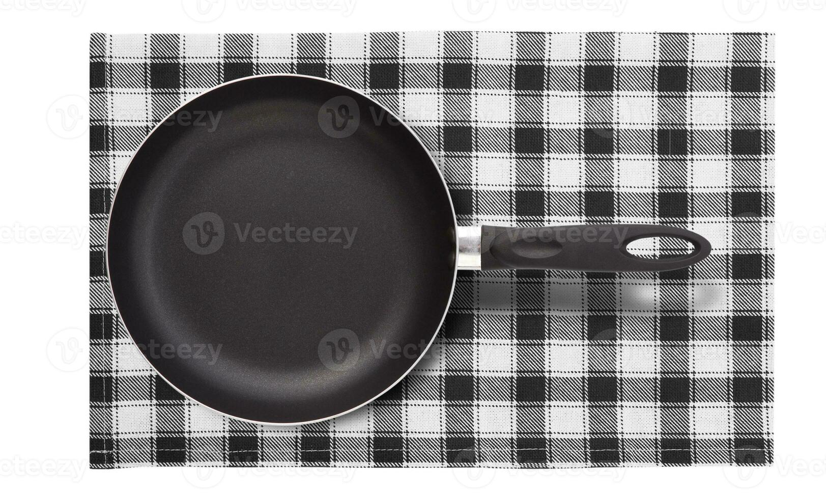 Frying pan on napkin isolated. Top view mockup. photo