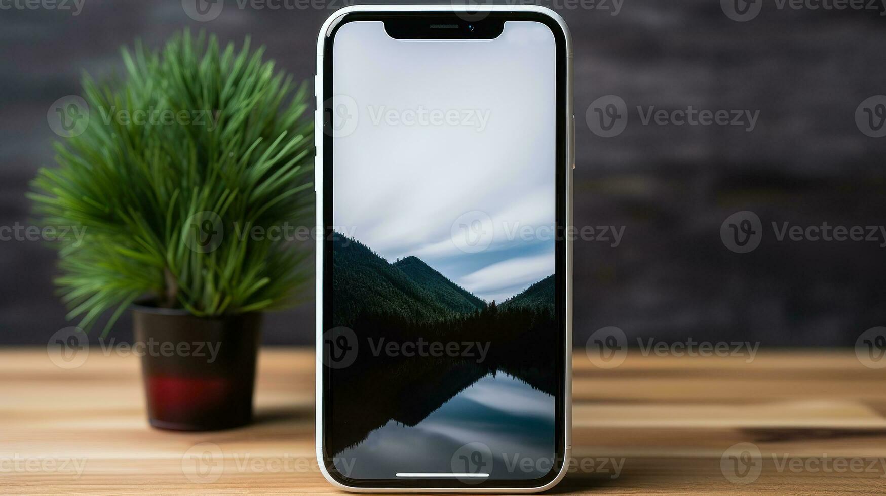 Smartphone with blank screen on wooden table and black wall background.. photo