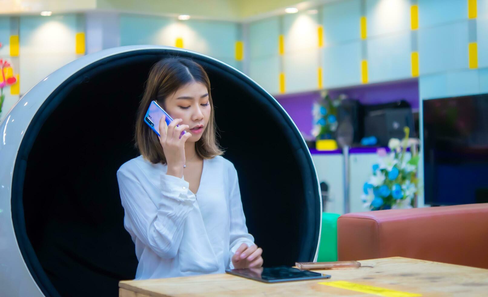 Serious expression on her face shows that the business woman understands the importance of clear communication in business, Digital marketing. photo