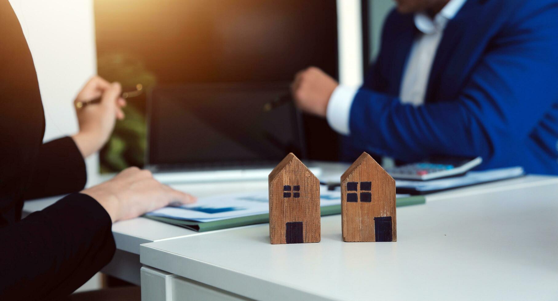 Female woman hands holding home model, small miniature white toy house. Mortgage property insurance dream moving home and real estate concept photo