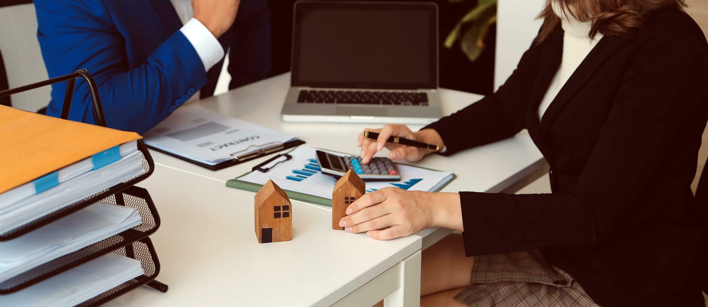 Female woman hands holding home model, small miniature white toy house. Mortgage property insurance dream moving home and real estate concept photo