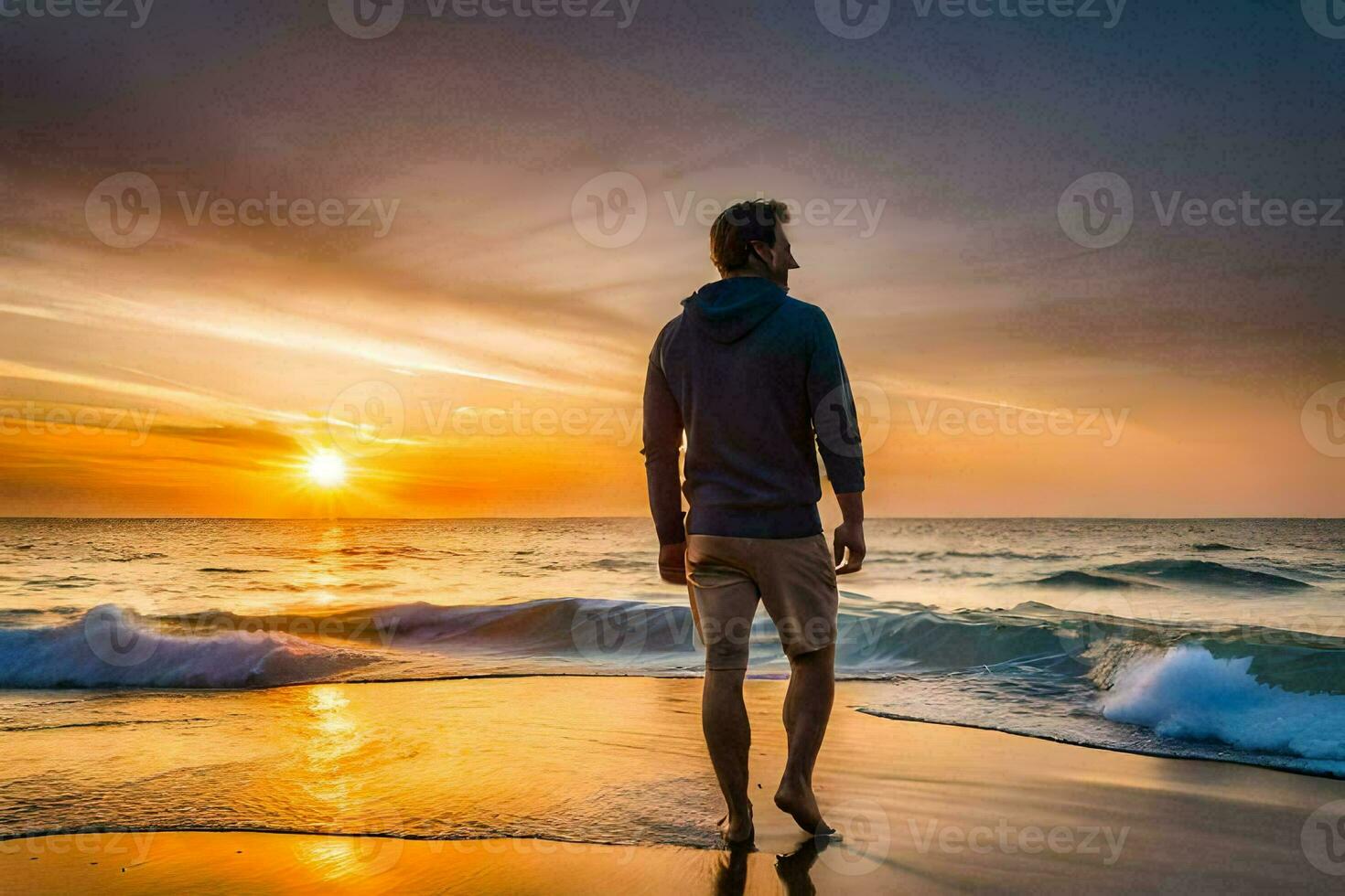 a man standing on the beach at sunset. AI-Generated photo