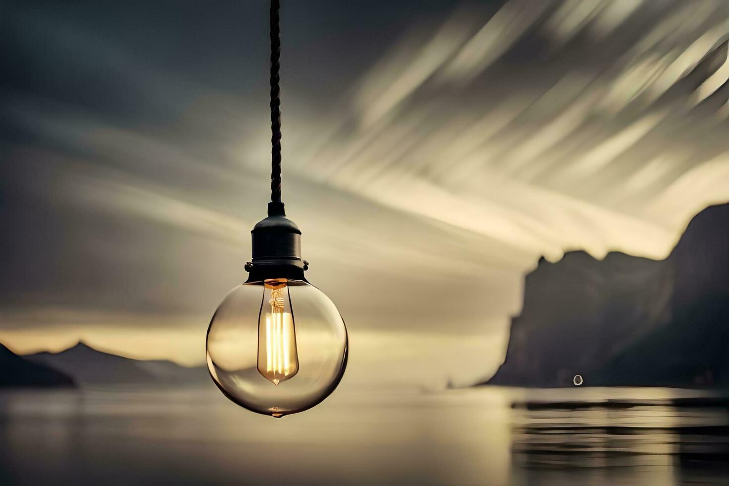 a light bulb hanging over the water with mountains in the background. AI-Generated photo
