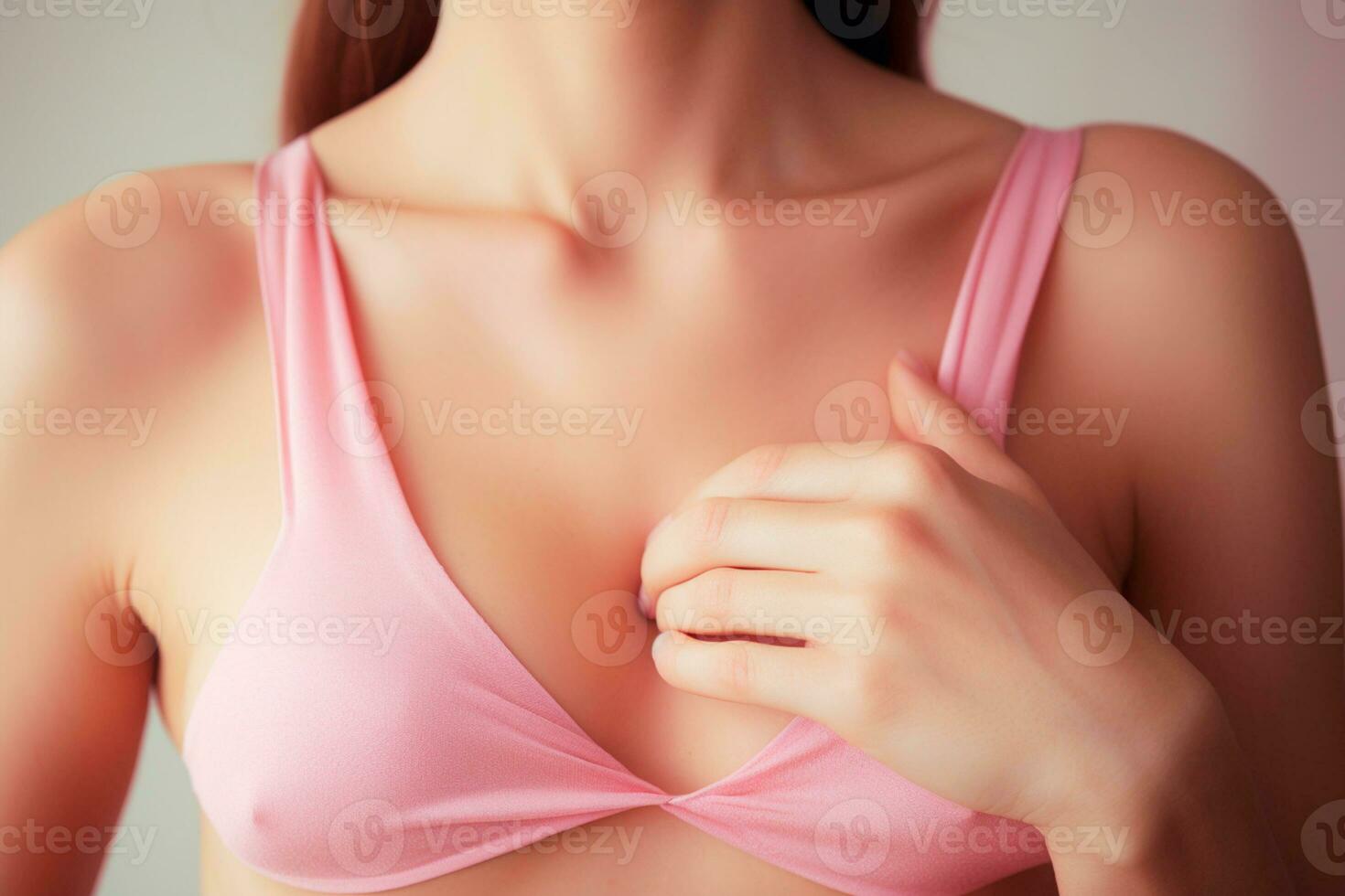 Pink October - Awareness spotlight, woman wearing pink blouse in support of breast cancer prevention. International awareness movement for the early detection of breast cancer. Generated by AI photo