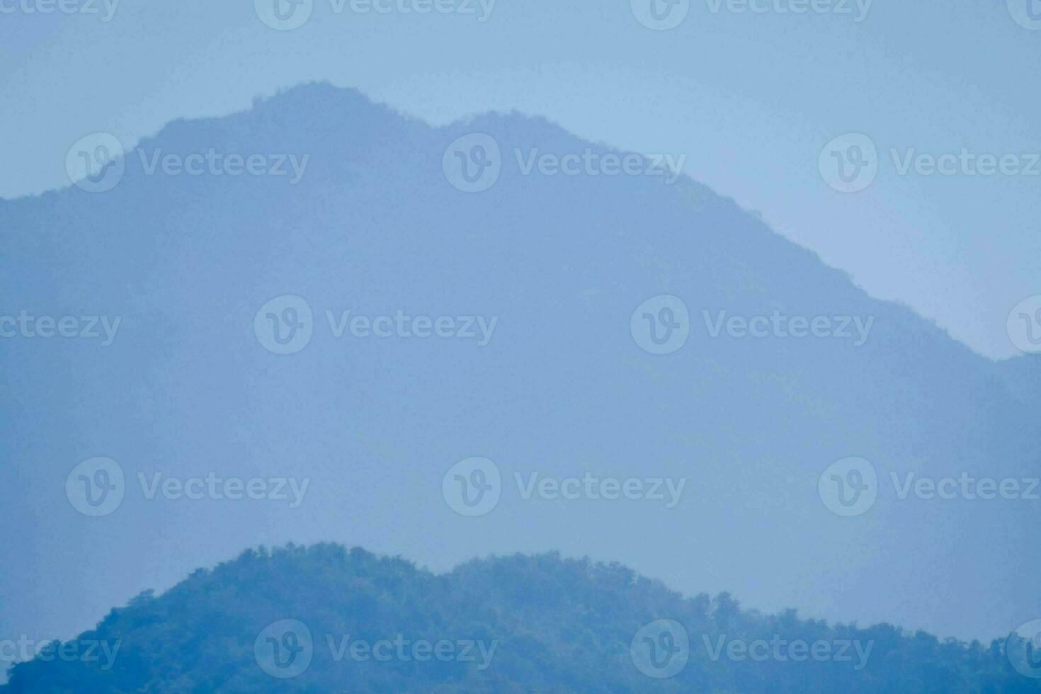 Silhouettes of mountains photo