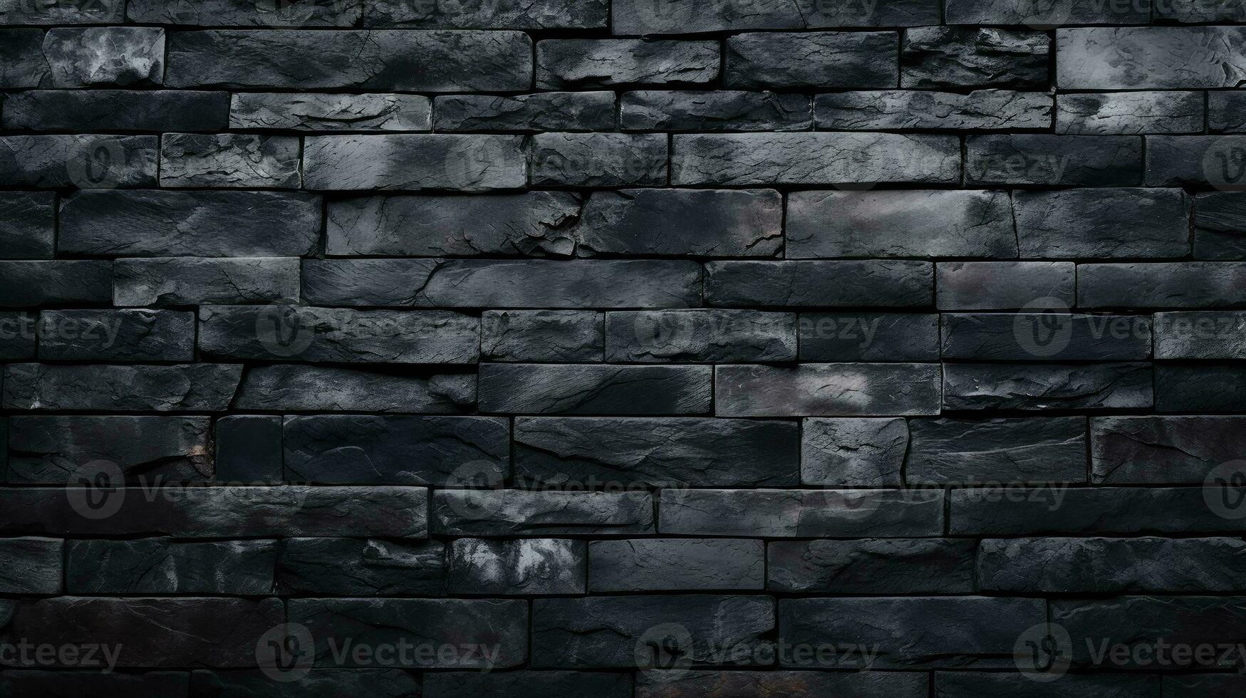 Bold and industrial. Black brick wall background with ample copy space photo