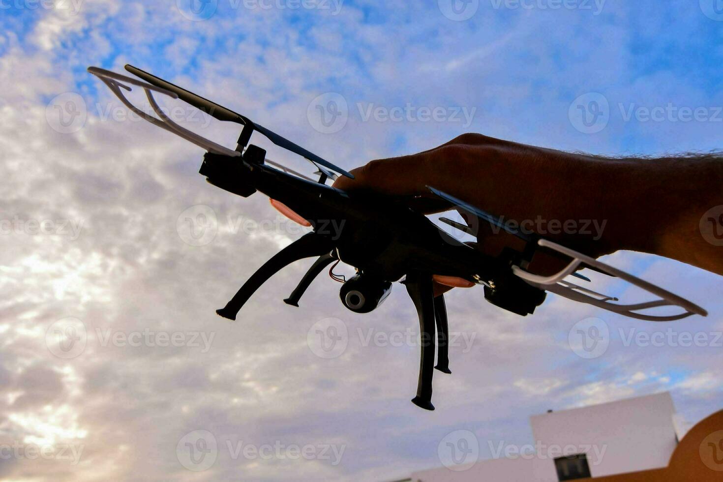 Hand holding drone photo