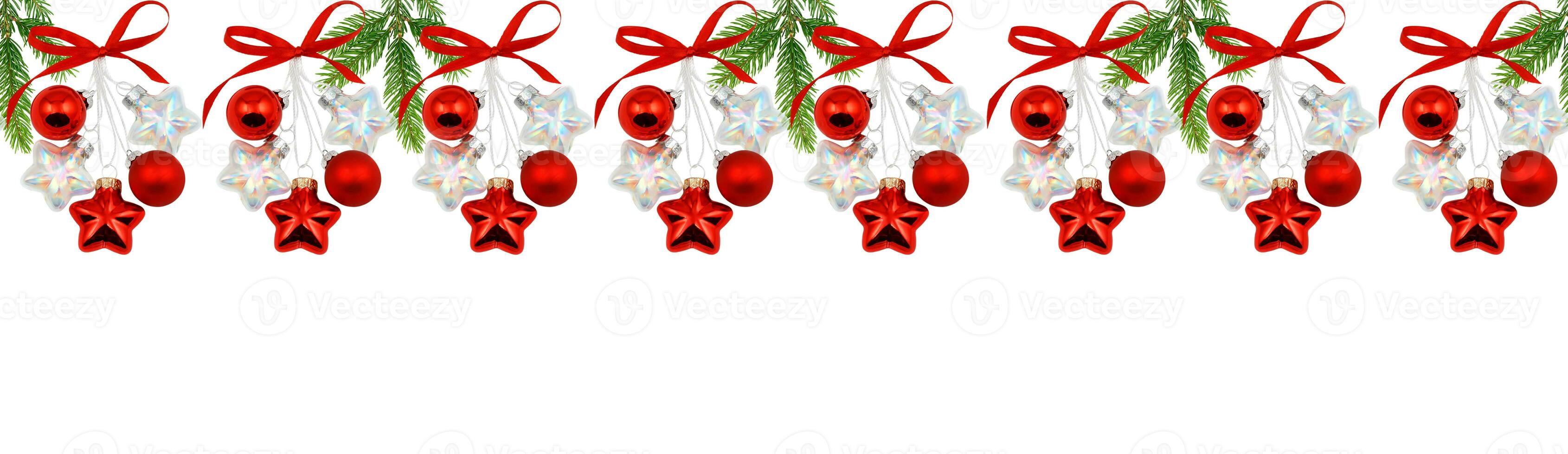 Horizontal seamless pattern from a Christmas ornament with branches of a Christmas tree isolated on a white background. photo