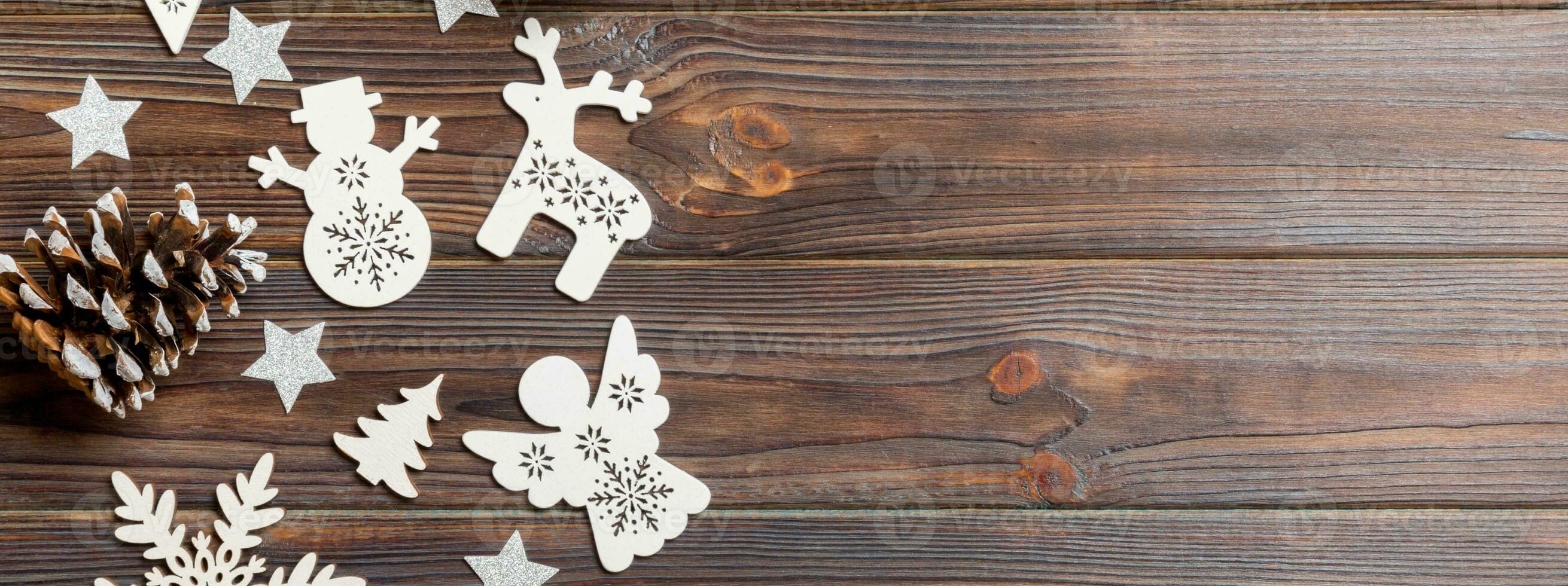 Top view of Banner Christmas decorations and toys on wooden background. Copy space. Empty place for your design. New Year concept photo