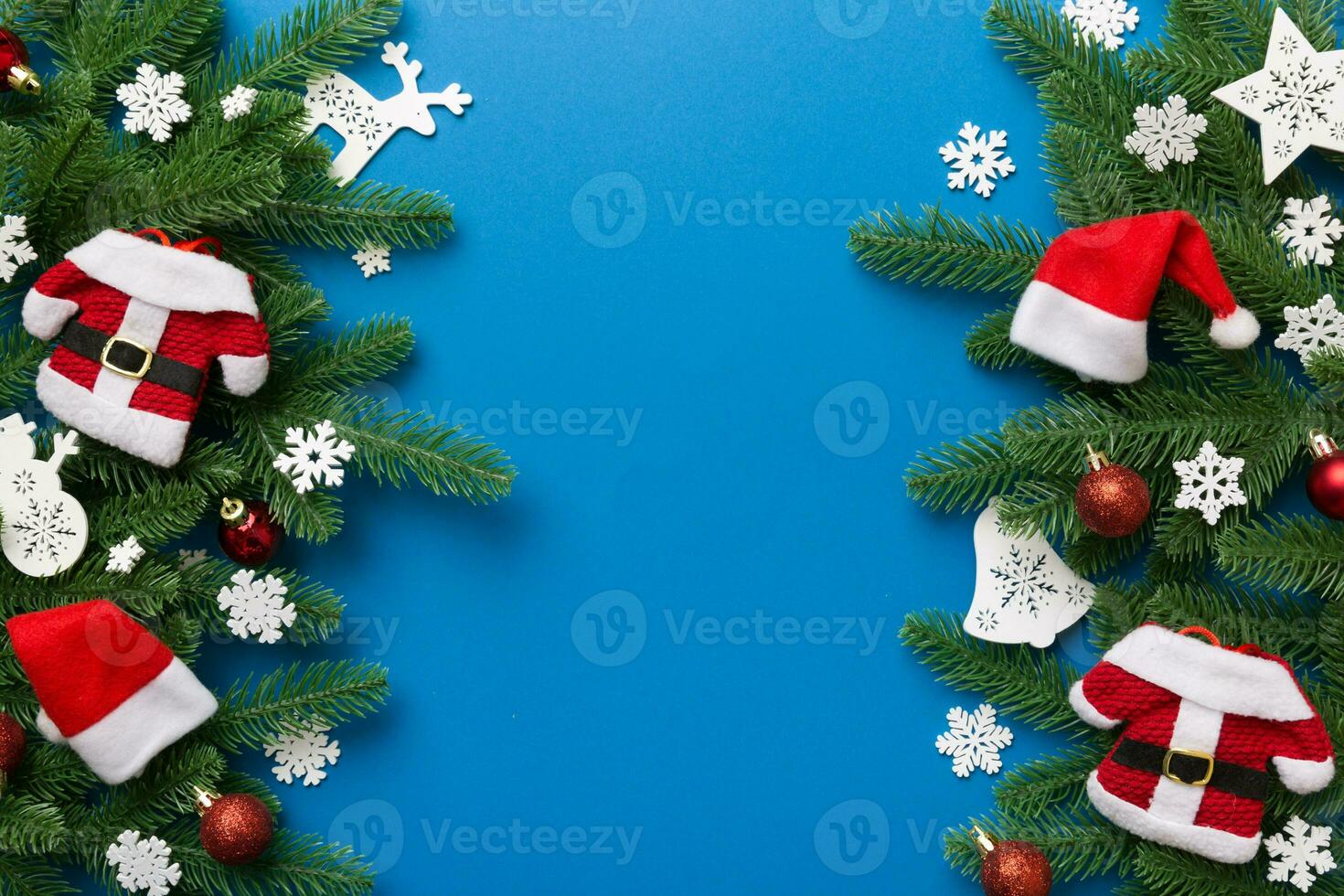 Christmas background with fir branches and Christmas decor. Top view, copy space for text photo