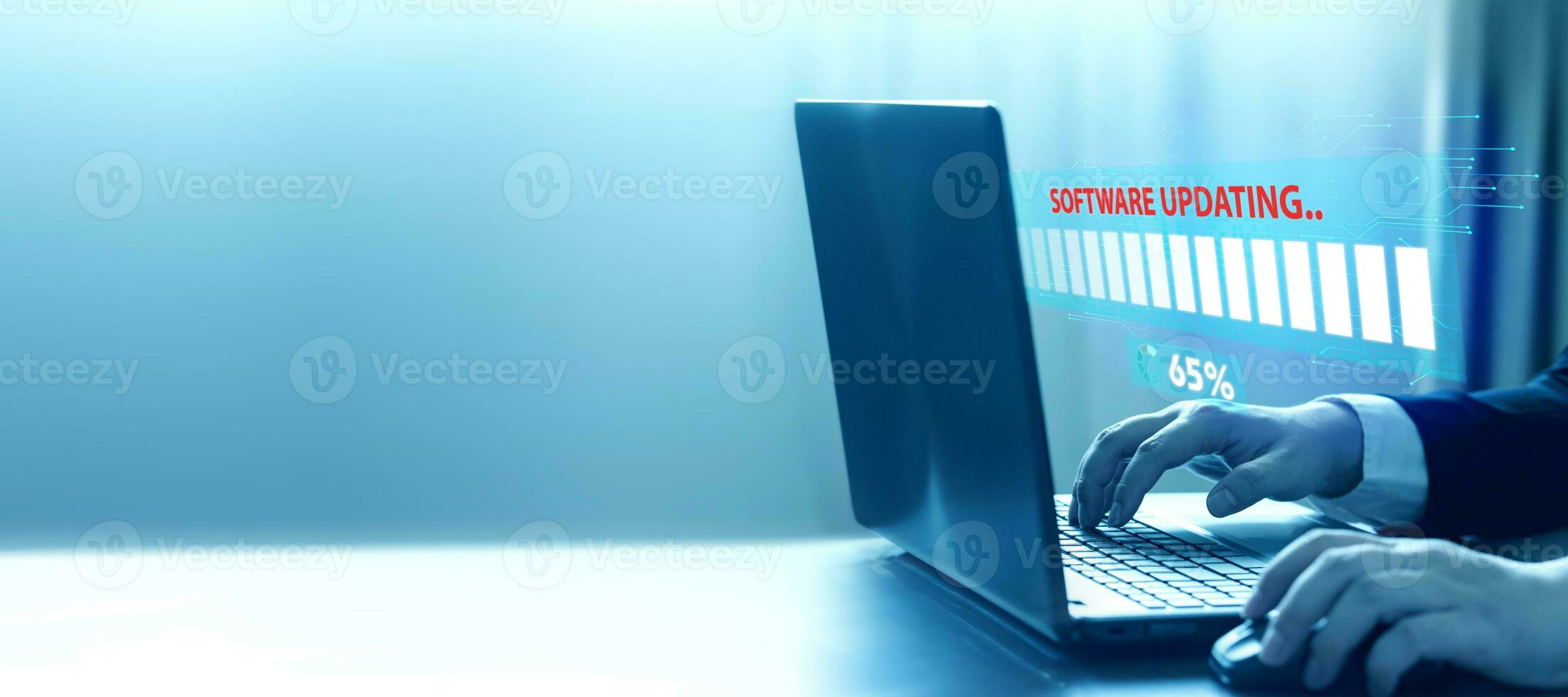 Updating the latest software version of the computer system via the internet network. Users are upgrading and improving versions of the computer model with show Working loading screen photo