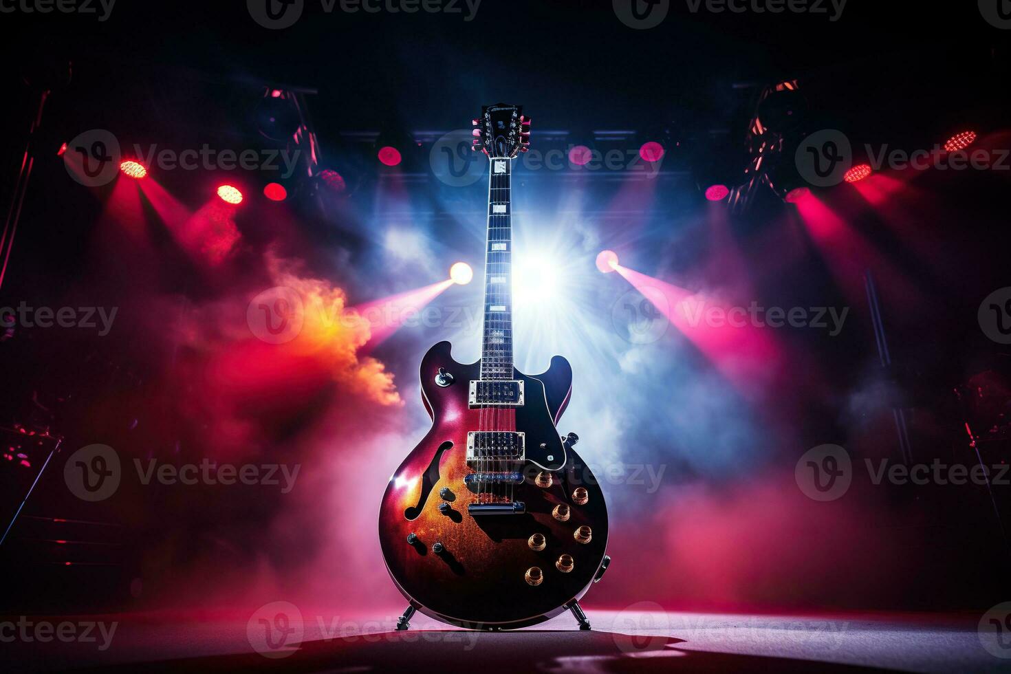 Electric guitar on stage in the rays of spotlights. Rock concert photo