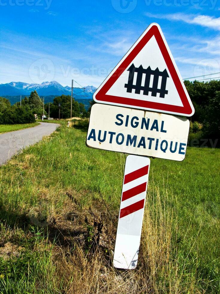 Automated Level Crossing Sign in French Countryside photo