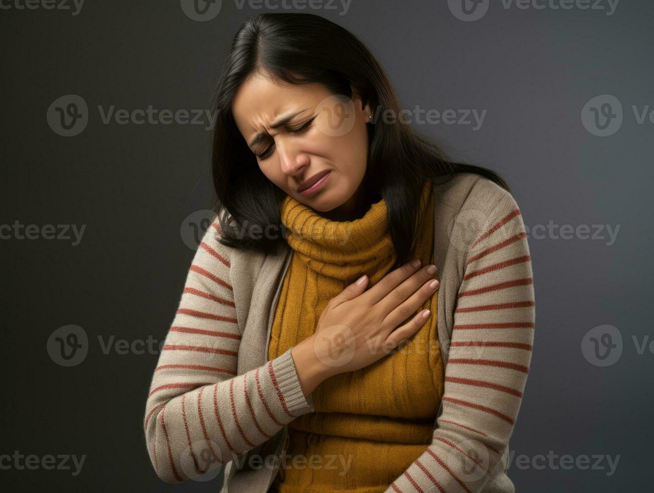 Mexican woman appears to be in pain on grey background AI Generative photo