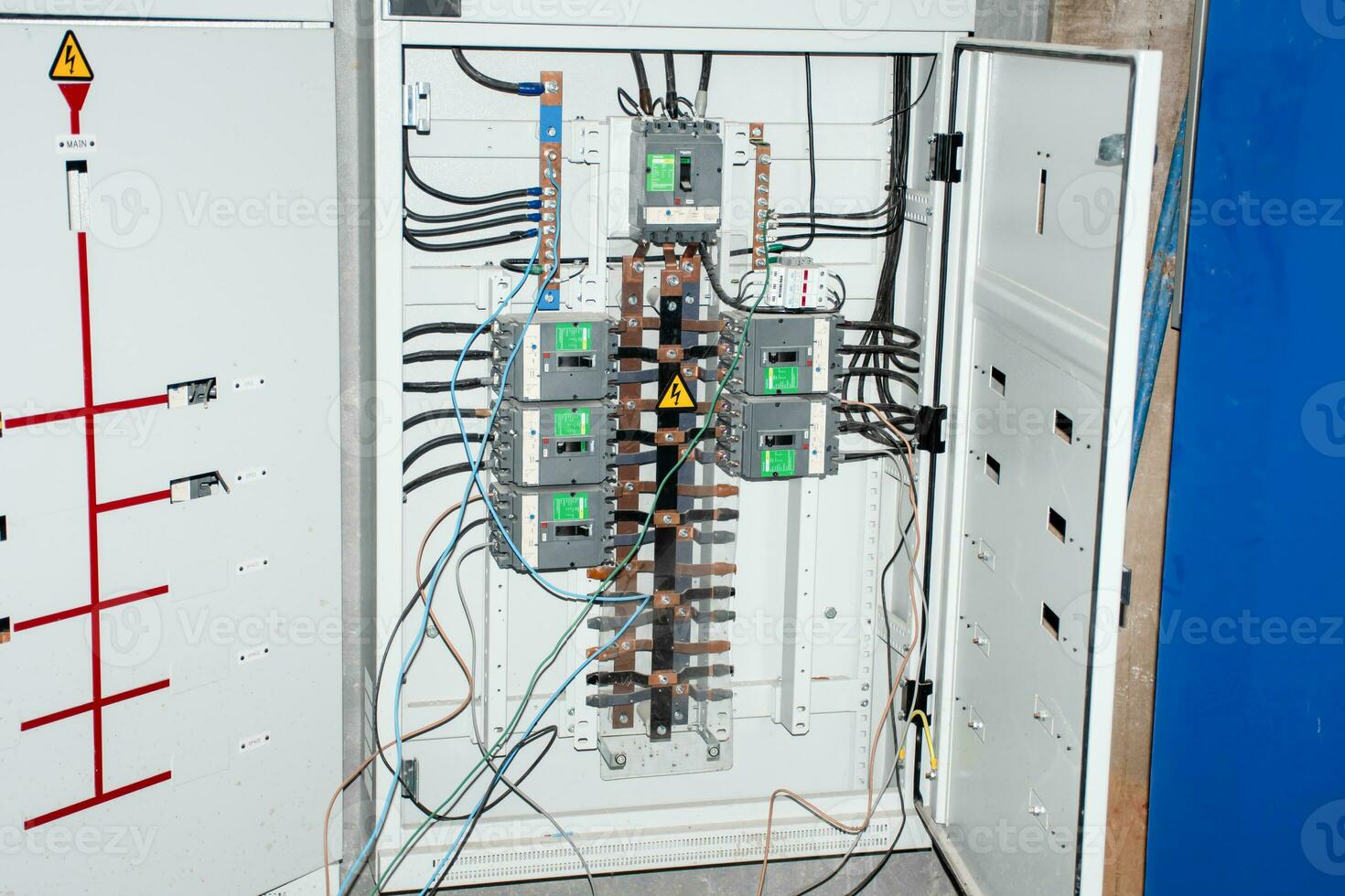 Automatic Transfer Switch installed under the building water to switch to automatically select power supply. Also known as the Motor Drive Switch, ATS device reduces risks and increases the stability. photo