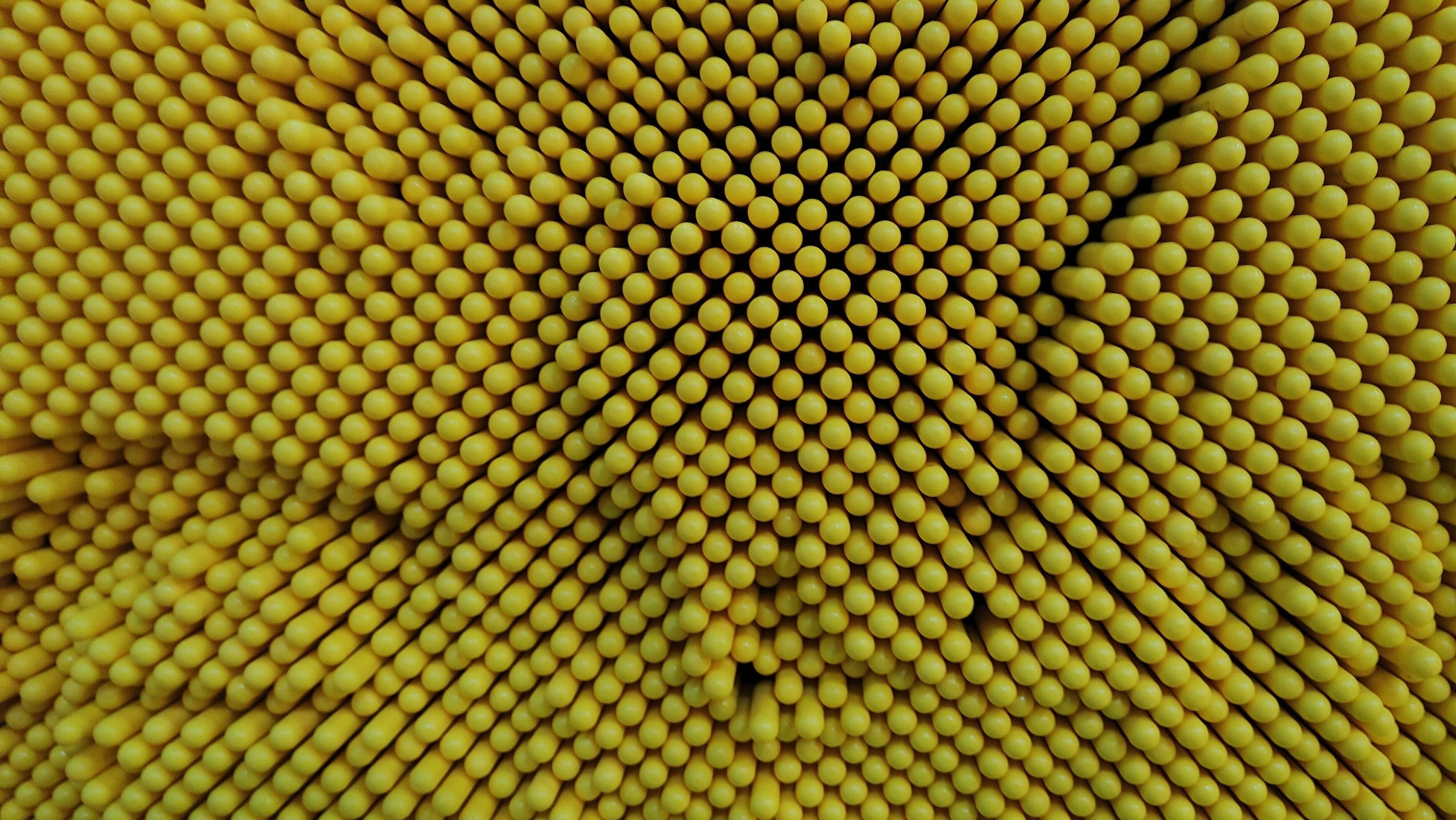 Beautiful pattern of yellow dot on pin screen. Texture background