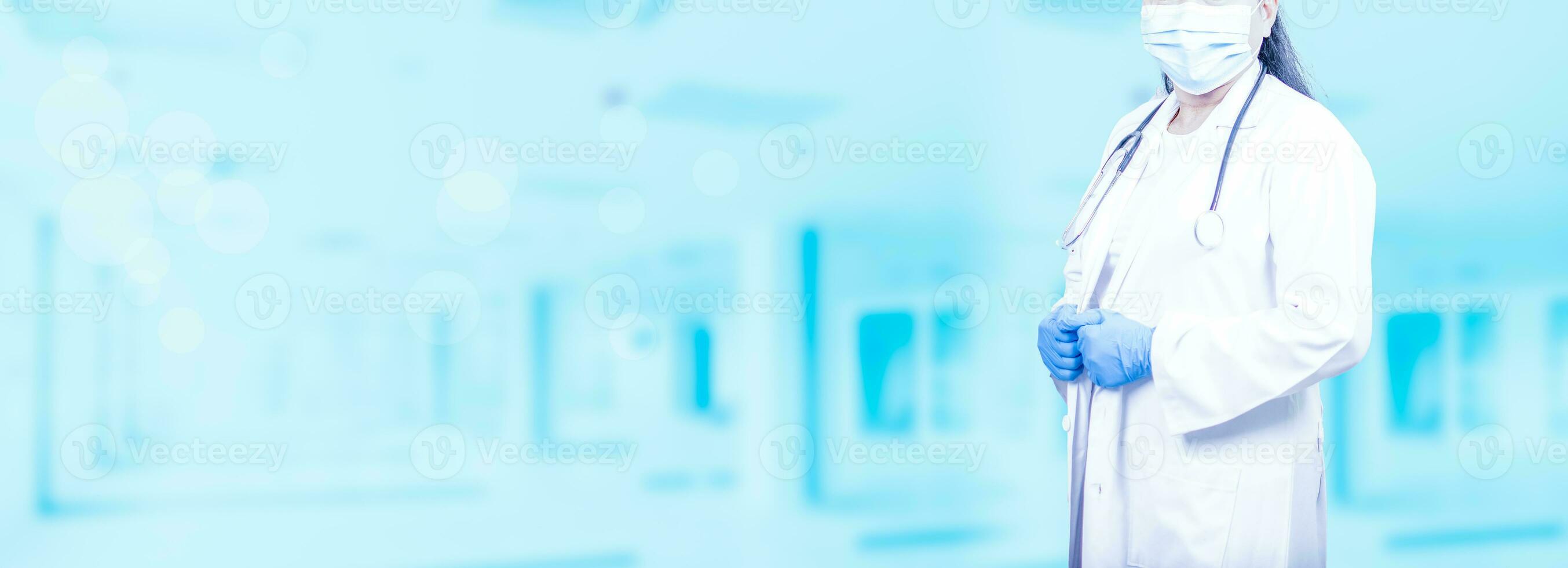 Woman doctor stands in front of an examination room in a hospital. concept of medical treatment health care annual health check Beauty, Research, Lab, Science, closeup, copy space, blurred background photo