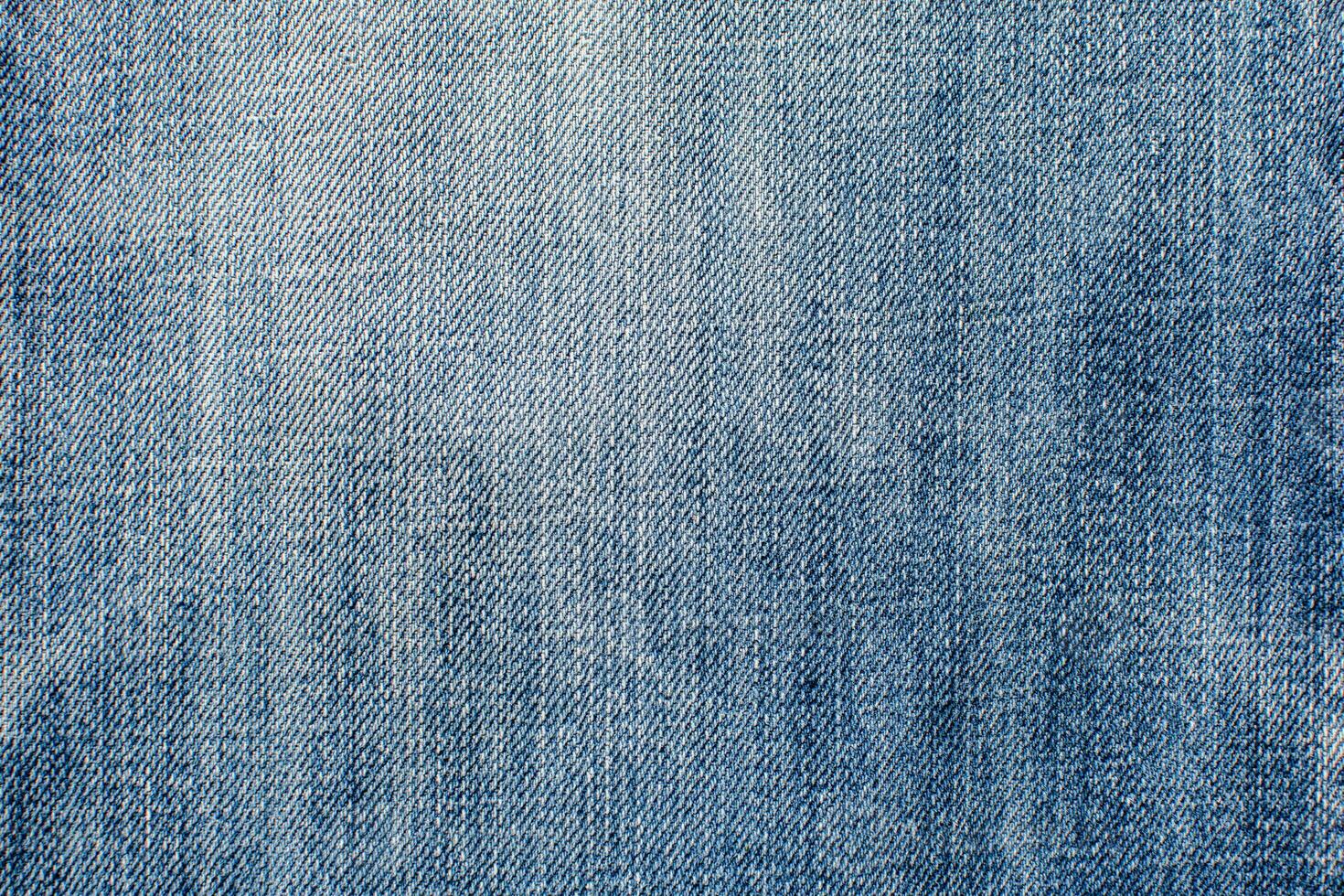 Abstract space perspective and a close-up of blank blue natural clean denim texture for traditional business background in fresh vibrant colors with diagonal gradient lines and dots. photo
