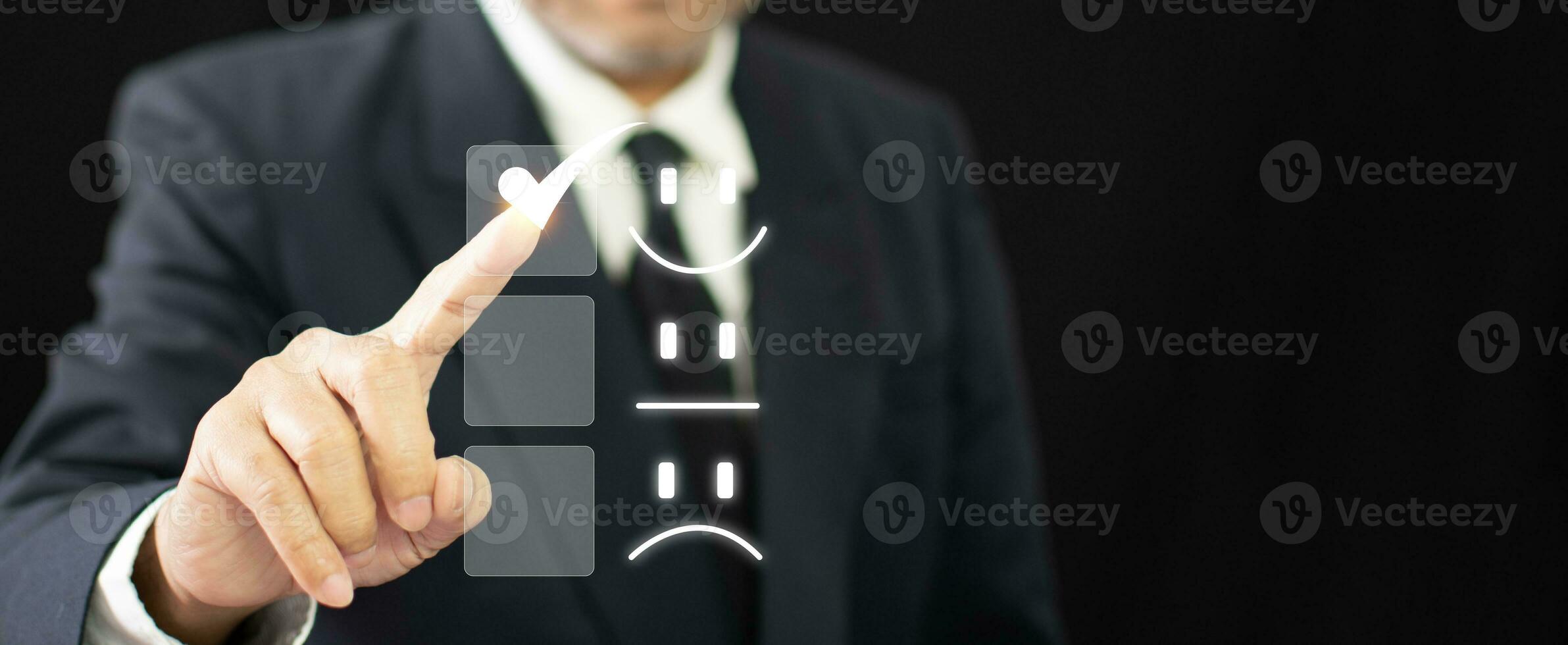 Satisfaction survey and Customer service concept, Businessman or Business people are touching a virtual screen on happy Smiley face icon symbol to give satisfaction in service. rating very impressed. photo