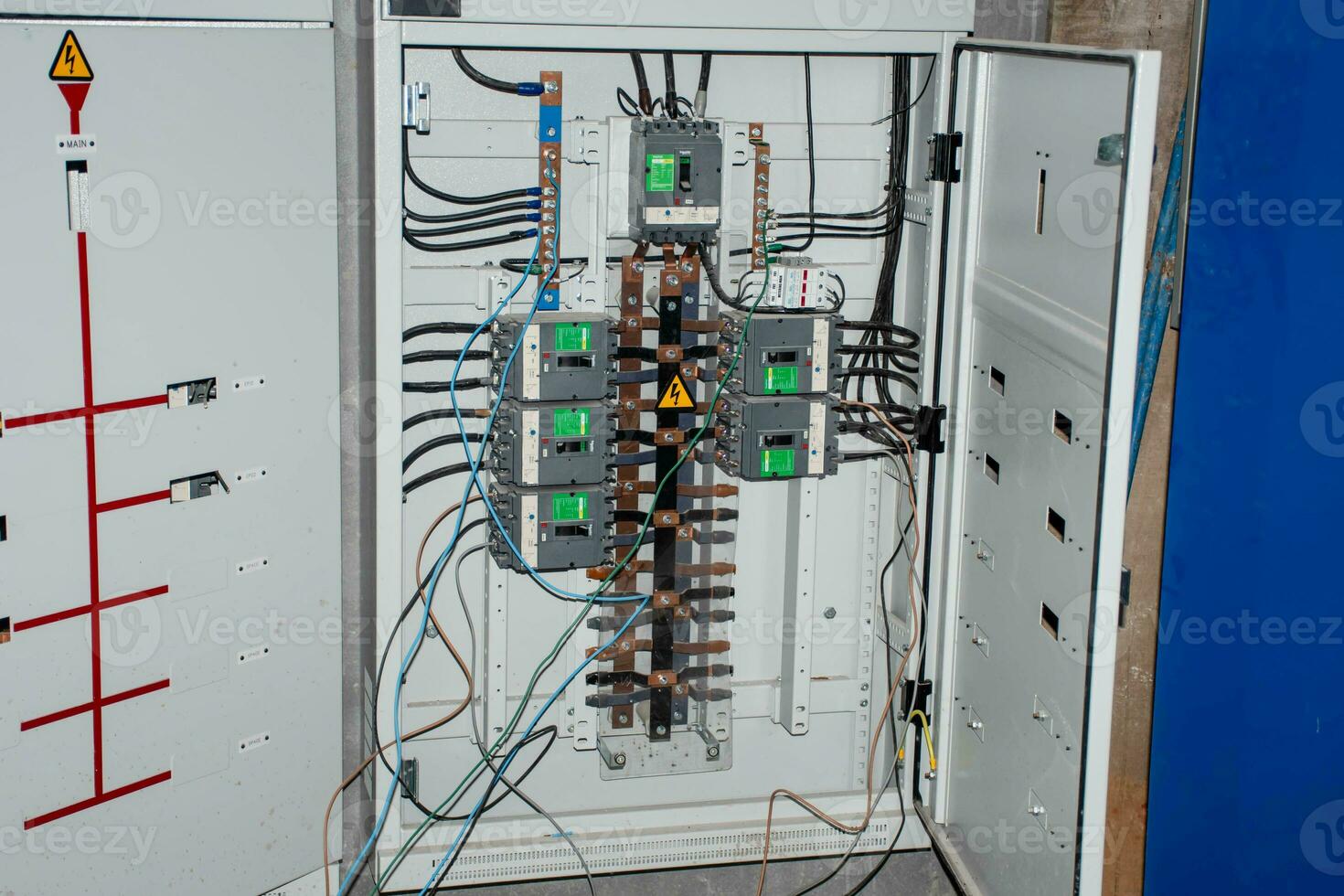 Automatic Transfer Switch installed under the building water to switch to automatically select power supply. Also known as the Motor Drive Switch, ATS device reduces risks and increases the stability. photo