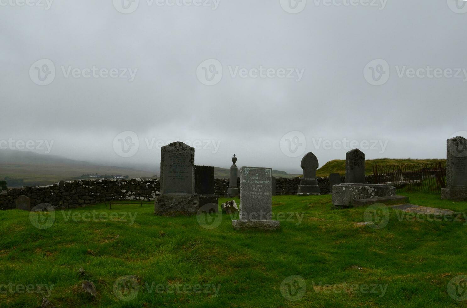 Gravestones at Dunvegan on the Isle of Skye photo