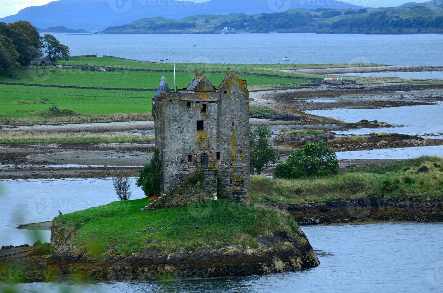 Ruins of Castle Stalker in Scotland photo