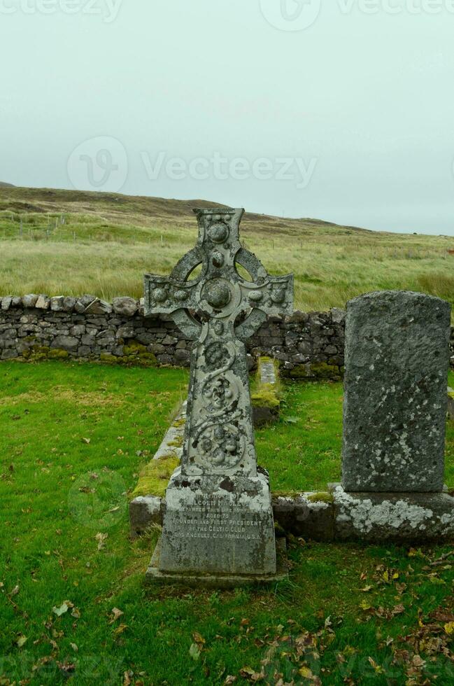 Stone Cross on the Isle of Skye in Scotland photo