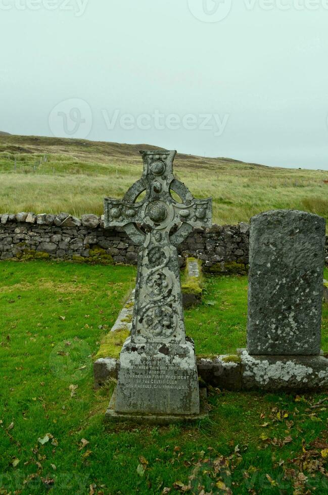 Stone Cross on the Isle of Skye in Scotland photo