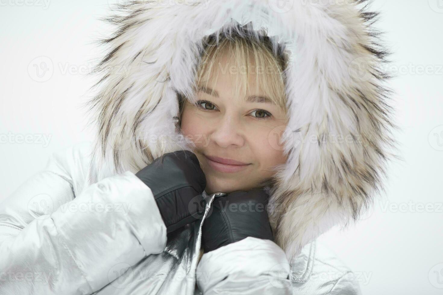 Woman in a furry furry hood photo