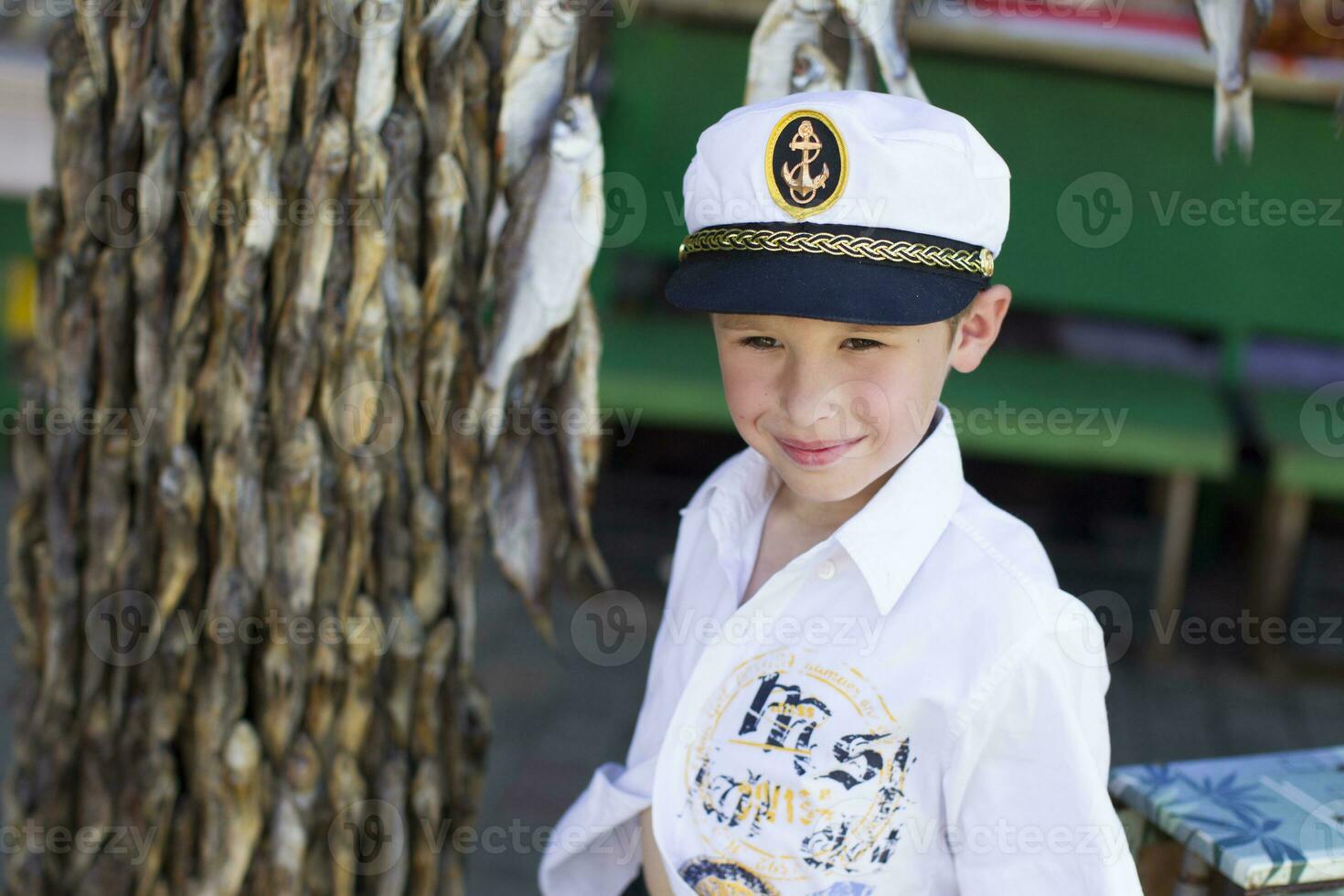 Ukraine. Odessa, August 28, 2018. Central Market.Little boy in a sailor hat photo