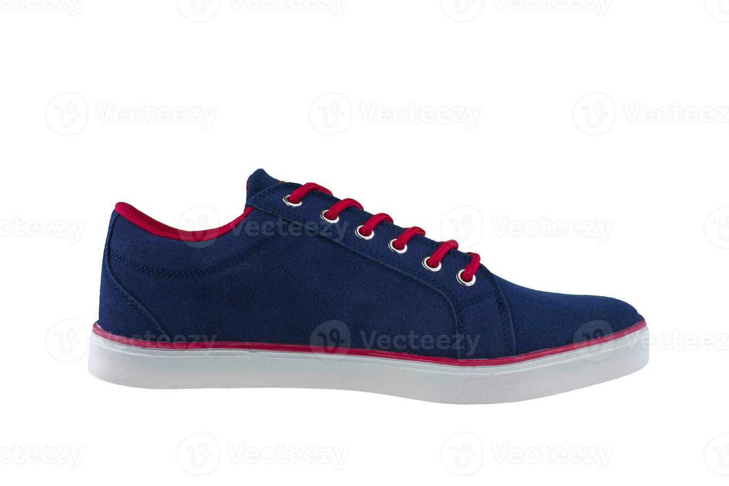 Sneakers. Sports shoes side view on a white background.Blue shoe with white sole and red laces photo