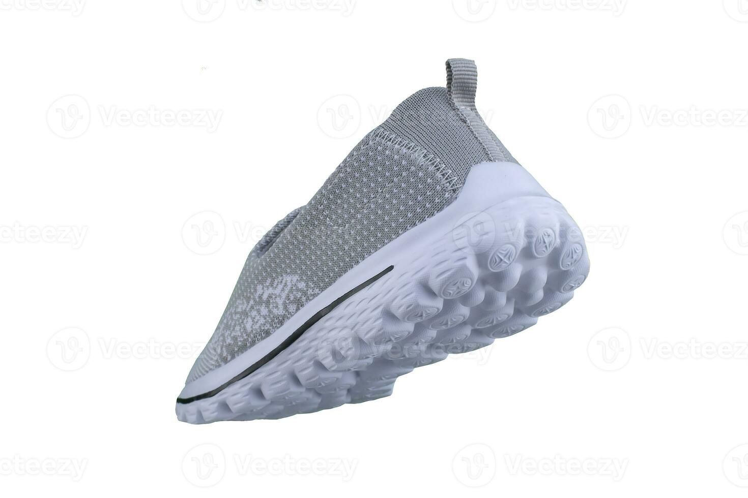 Sneaker gray on a white sole. Sport shoes on a white background. photo