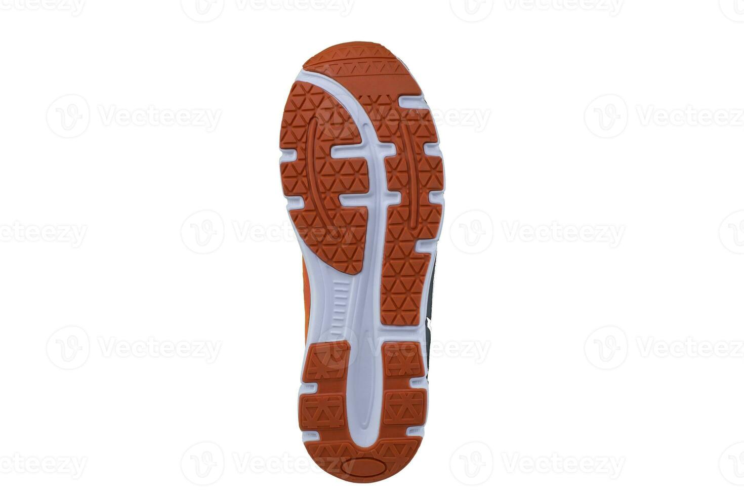 Orange and white rubber sole with sneakers on a white background. photo