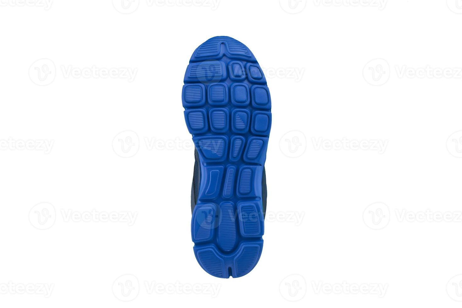 Blue rubber sole with sneakers on a white background. photo