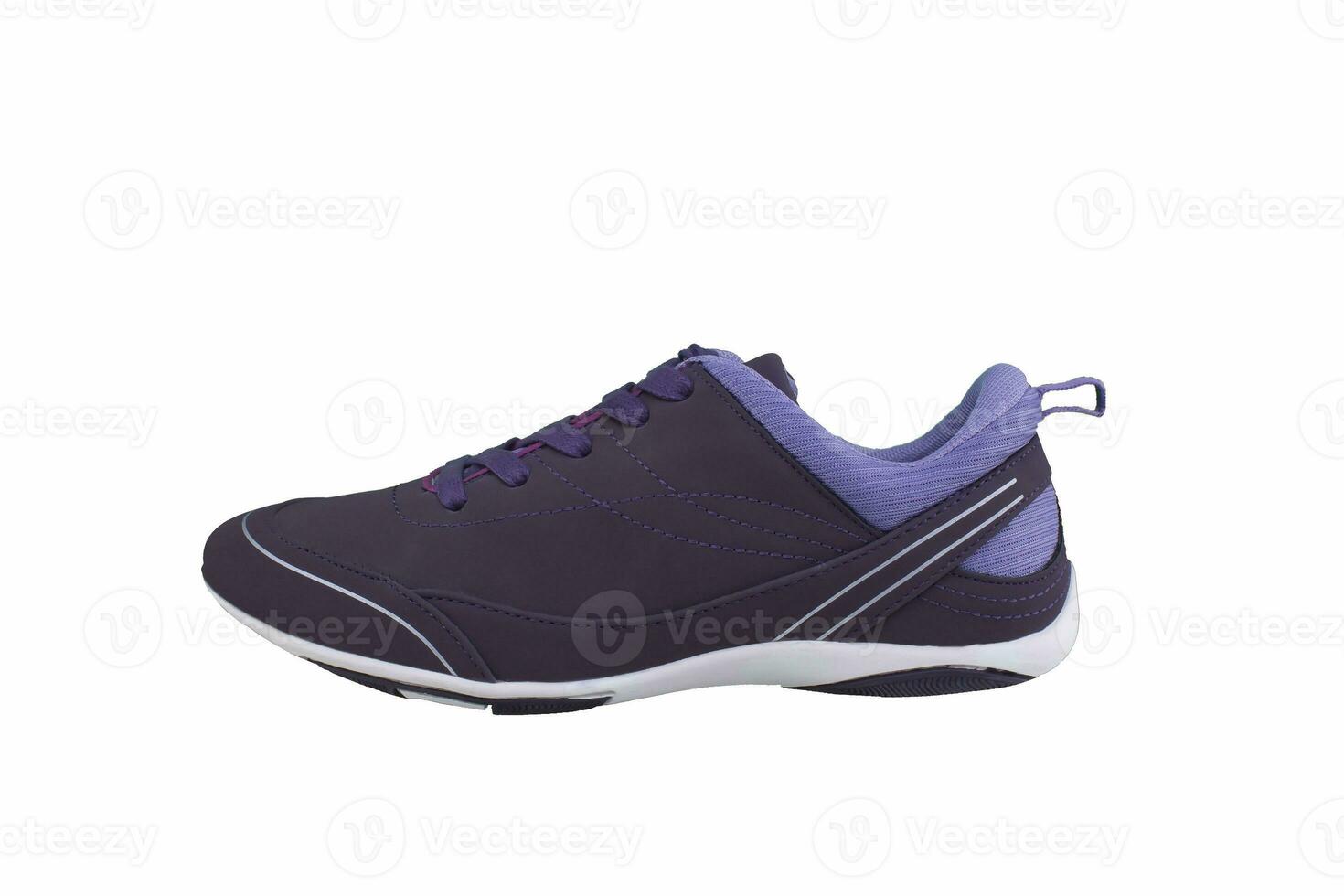 Sneaker purple on a white sole. Sport shoes on a white background. photo